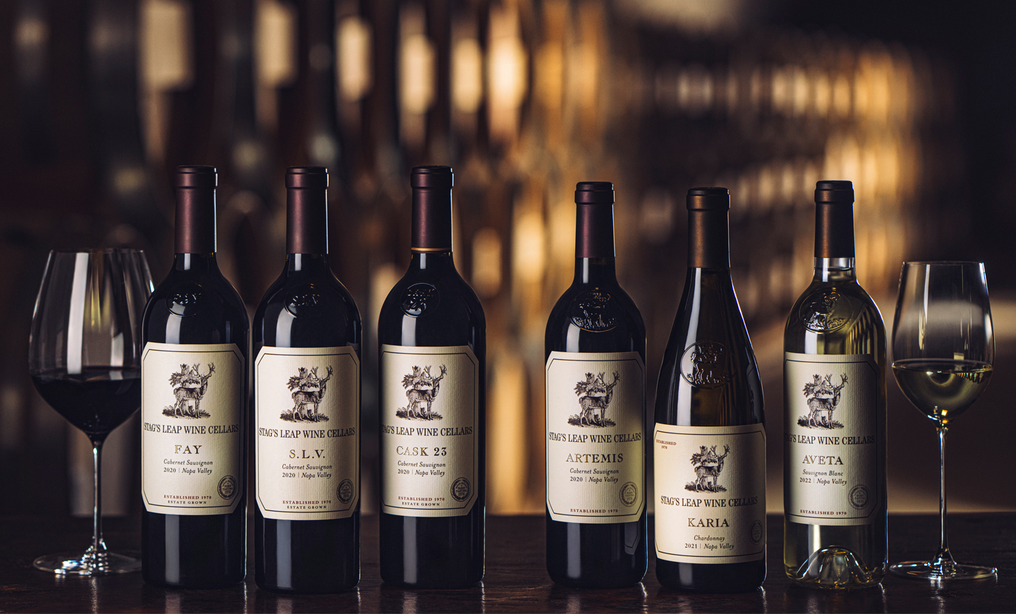 Collection of Stag's Leap Wine Cellars wine bottles in their wine cave. Six bottles, FAY Cabernet Sauvignon, S.L.V. Cabernet Sauvignon, CASK 23 Cabernet Sauvignon, ARTEMIS Cabernet Sauvignon, KARIA Chardonnay, AVETA Sauvignon Blanc.